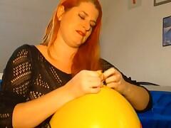 This Redhead Mature Have A Balloon Fetish